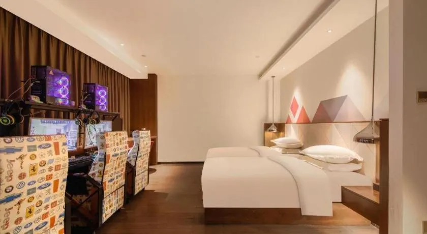 Bed in Borrman Hotel Zhongxiang Railway Station Mochou Village