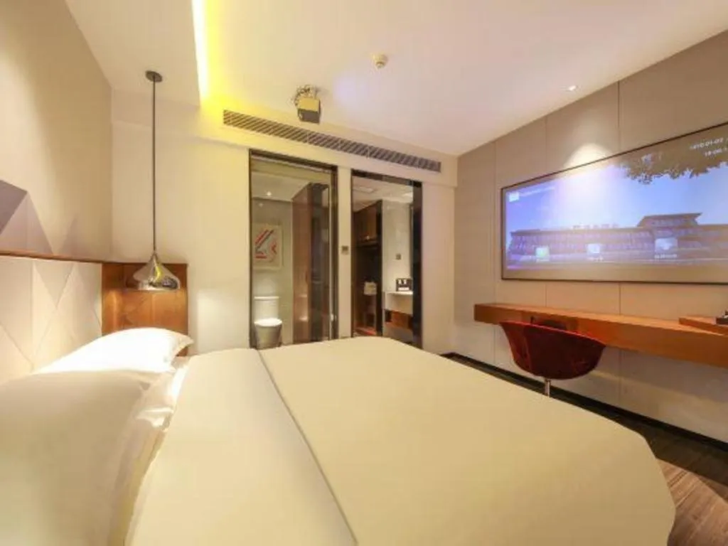 Bed in Borrman Hotel Zhongxiang Railway Station Mochou Village