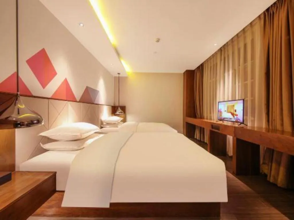 Bed in Borrman Hotel Zhongxiang Railway Station Mochou Village