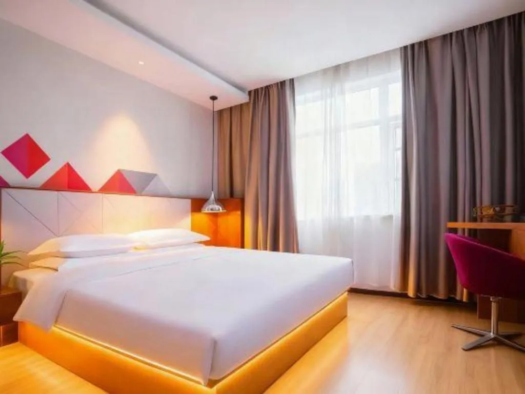 Bed in Borrman Hotel Zhongxiang Railway Station Mochou Village