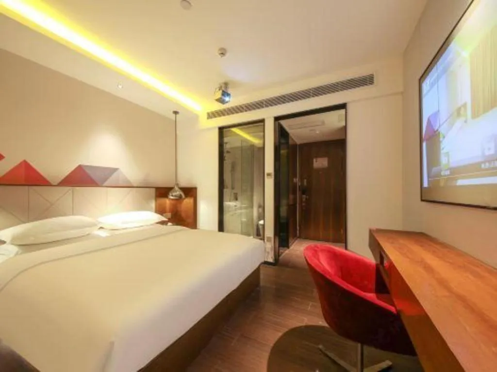 Bed in Borrman Hotel Zhongxiang Railway Station Mochou Village