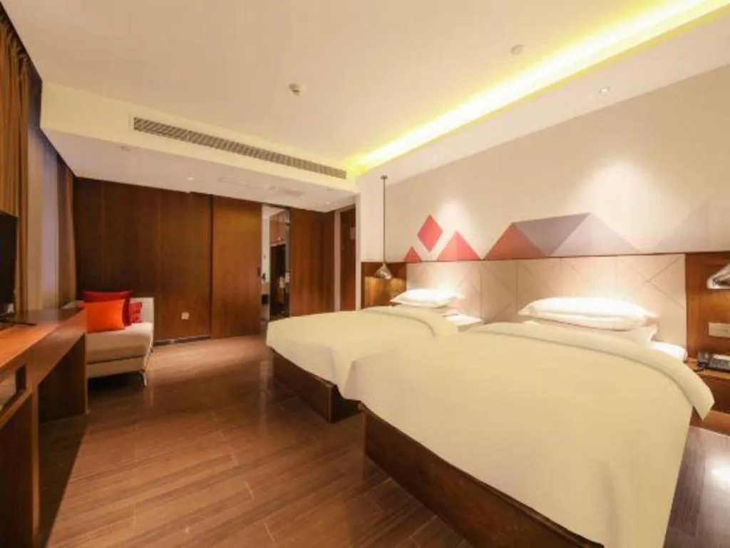 Bed in Borrman Hotel Zhongxiang Railway Station Mochou Village