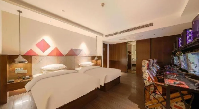 Bed in Borrman Hotel Zhongxiang Railway Station Mochou Village