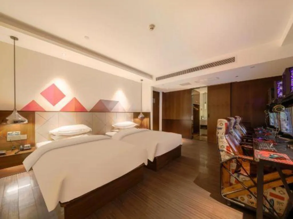 Bed in Borrman Hotel Zhongxiang Railway Station Mochou Village