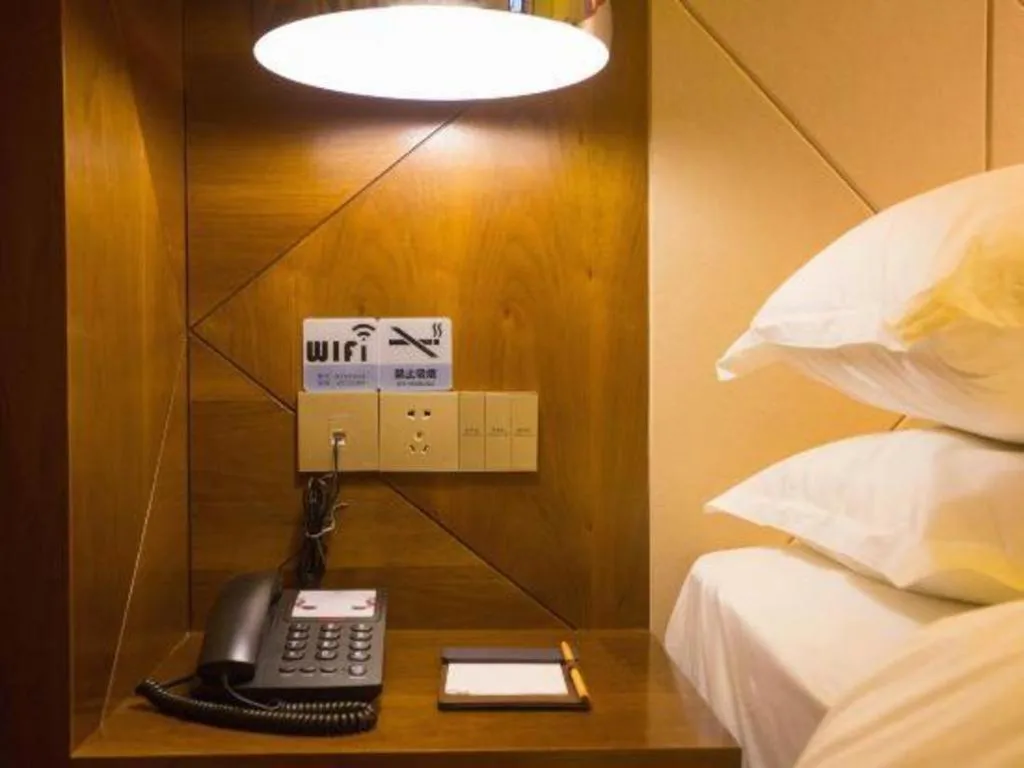 Bed in Borrman Hotel Zhongxiang Railway Station Mochou Village