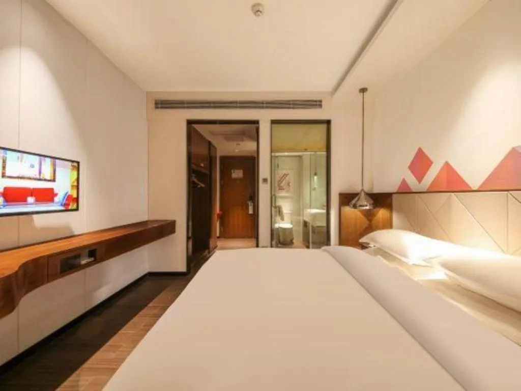 Bed in Borrman Hotel Zhongxiang Railway Station Mochou Village