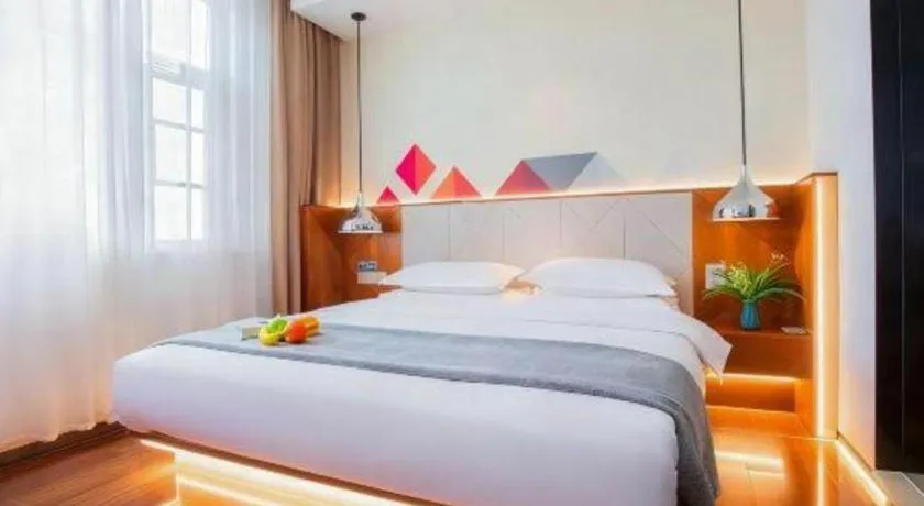 Bed in Borrman Hotel Zhongxiang Railway Station Mochou Village