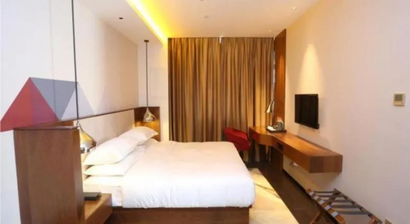 Bed in Borrman Hotel Zhongxiang Railway Station Mochou Village