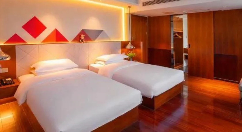 Bed in Borrman Hotel Zhongxiang Railway Station Mochou Village