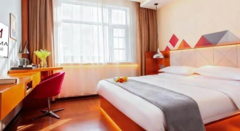 Bed in Borrman Hotel Zhongxiang Railway Station Mochou Village