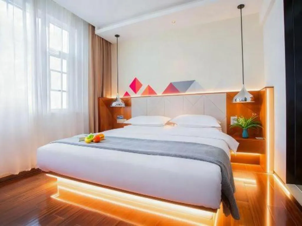 Bed in Borrman Hotel Zhongxiang Railway Station Mochou Village