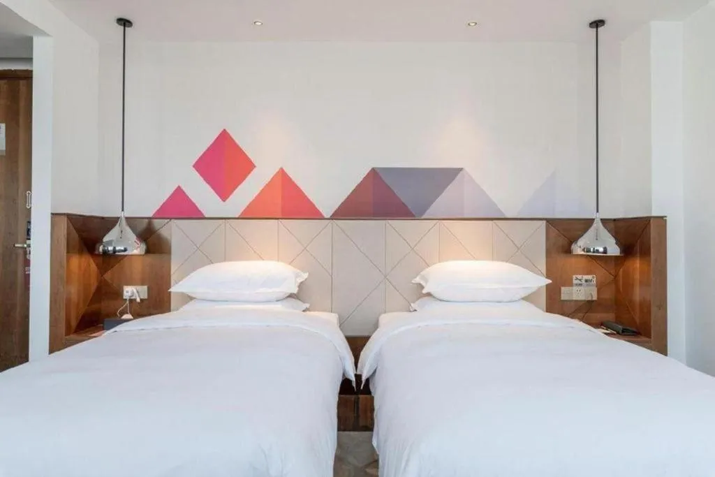 Bed in Borrman Hotel Zhongxiang Railway Station Mochou Village