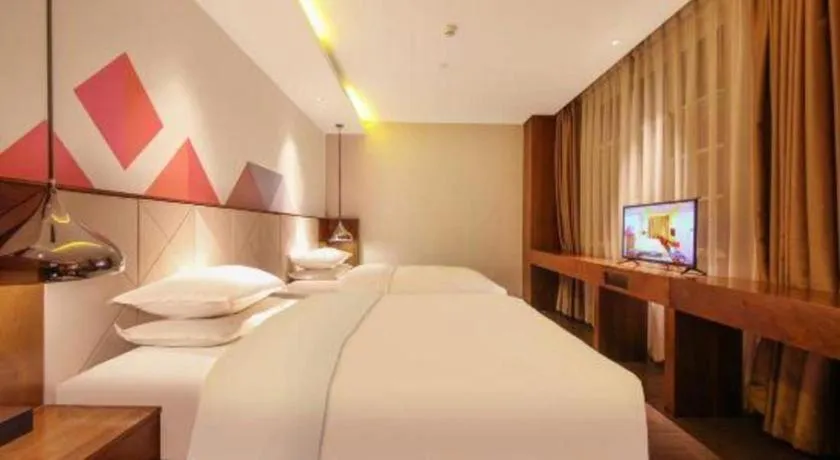 Bed in Borrman Hotel Zhongxiang Railway Station Mochou Village