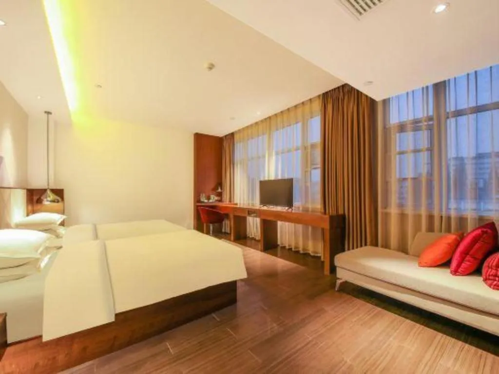 Bed in Borrman Hotel Zhongxiang Railway Station Mochou Village