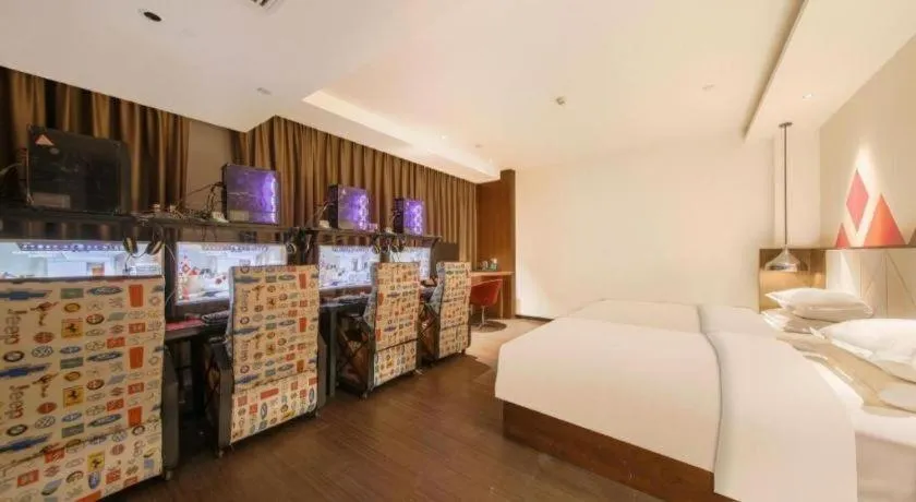 Bed in Borrman Hotel Zhongxiang Railway Station Mochou Village