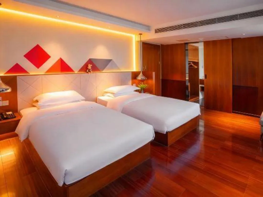 Bed in Borrman Hotel Zhongxiang Railway Station Mochou Village