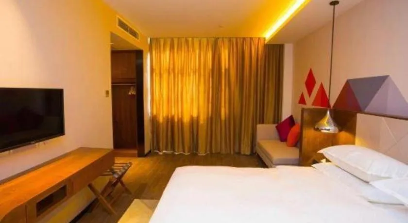 Bed in Borrman Hotel Zhongxiang Railway Station Mochou Village