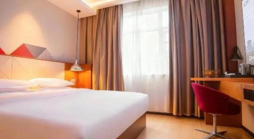 Bed in Borrman Hotel Zhongxiang Railway Station Mochou Village