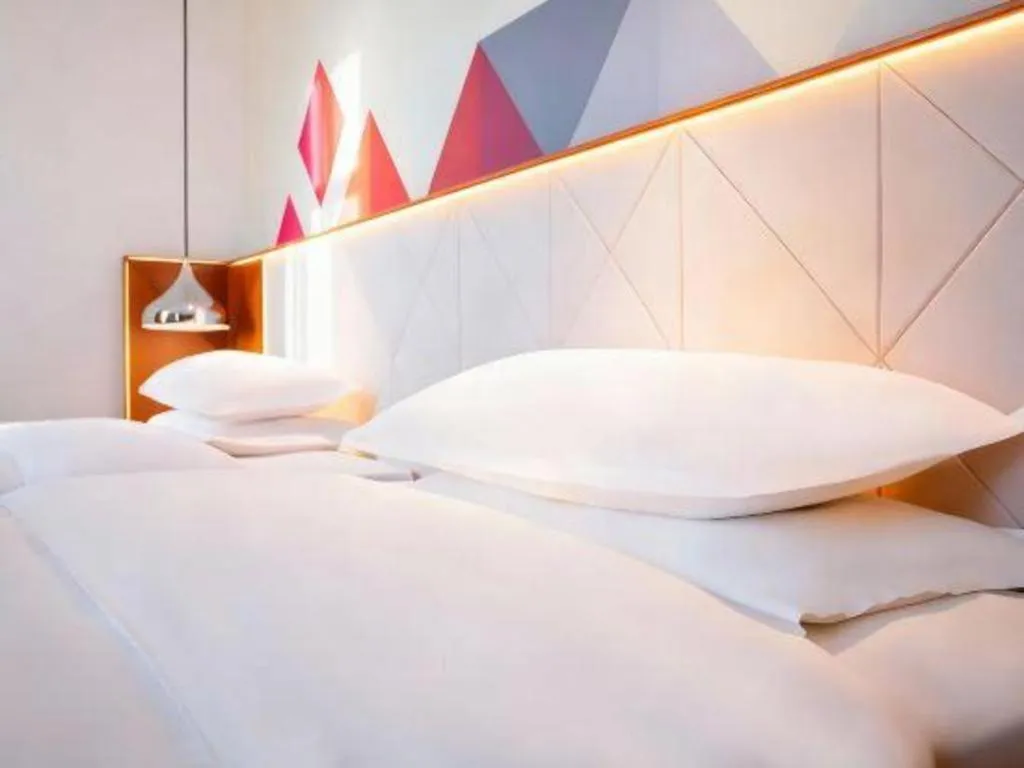 Bed in Borrman Hotel Zhongxiang Railway Station Mochou Village