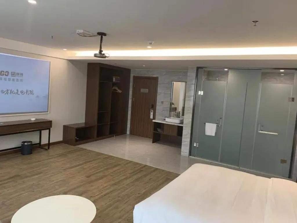 Bed in Borrman Hotel East Huai'an Railway Station Zhou 'Enlai Memorial