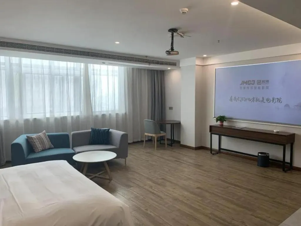 Bed in Borrman Hotel East Huai'an Railway Station Zhou 'Enlai Memorial