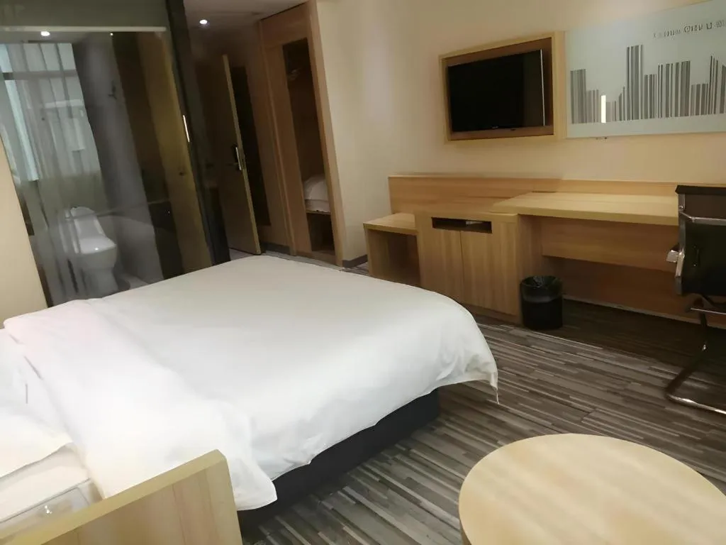 Bed in City Comfort Inn Wuhan Pangxiejia Metro Station