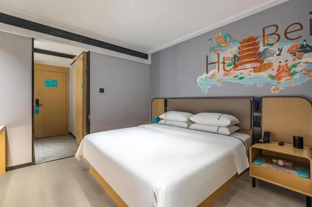 Bed in City Comfort Inn Wuhan Pangxiejia Metro Station