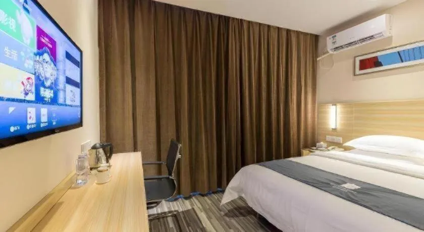 Bed in JTOUR Inn Wuzhou Arcade City Sanzongfu