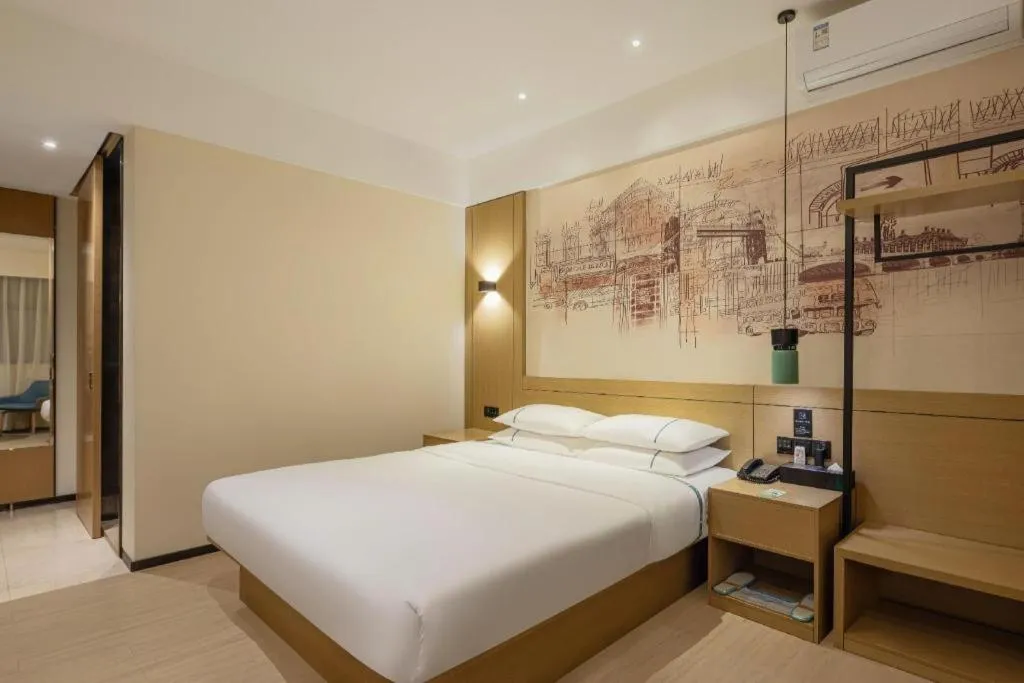 Bed in City Comfort Inn Guangzhou Liwan Zengjiao Jushu Metro Station