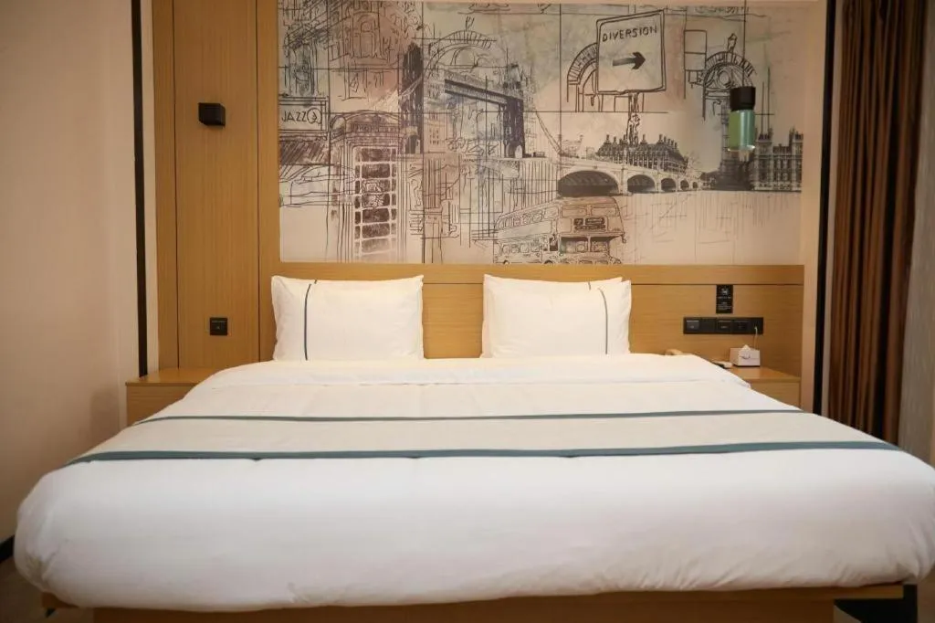 Bed in City Comfort Inn Guangzhou Liwan Zengjiao Jushu Metro Station