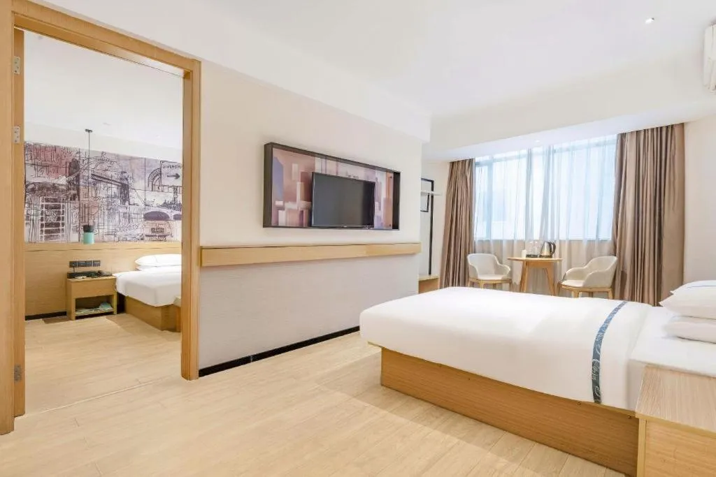 Bed in City Comfort Inn Guangzhou Liwan Zengjiao Jushu Metro Station