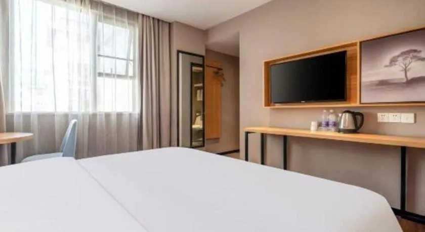 Bed in JTOUR Inn Guigang Life Port High-speed Railway Station