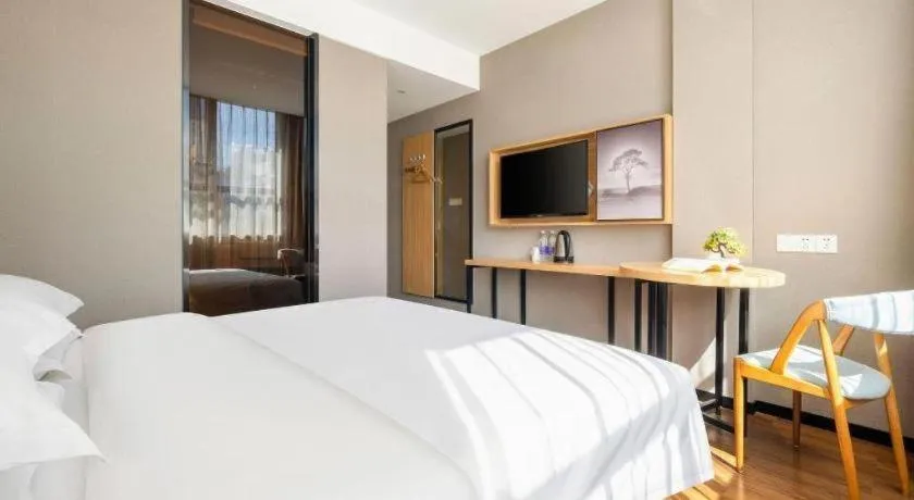 Bed in JTOUR Inn Guigang Life Port High-speed Railway Station