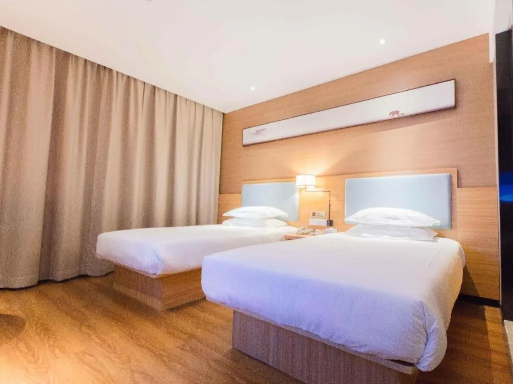 Bed in JTOUR Inn Guigang Life Port High-speed Railway Station