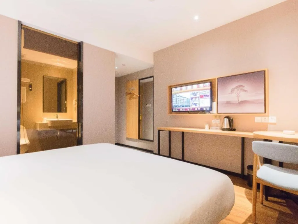 Bed in JTOUR Inn Guigang Life Port High-speed Railway Station