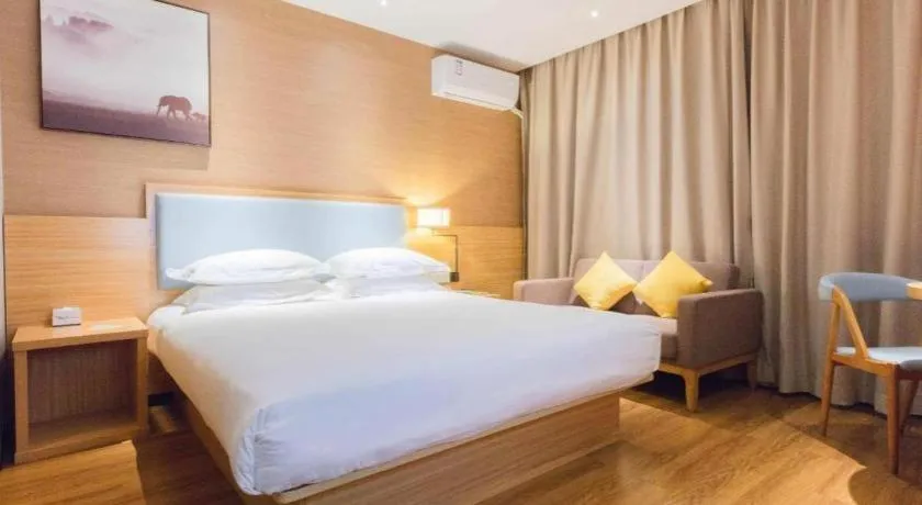 Bed in JTOUR Inn Guigang Life Port High-speed Railway Station