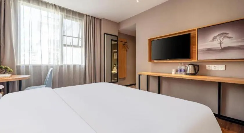 Bed in JTOUR Inn Guigang Life Port High-speed Railway Station