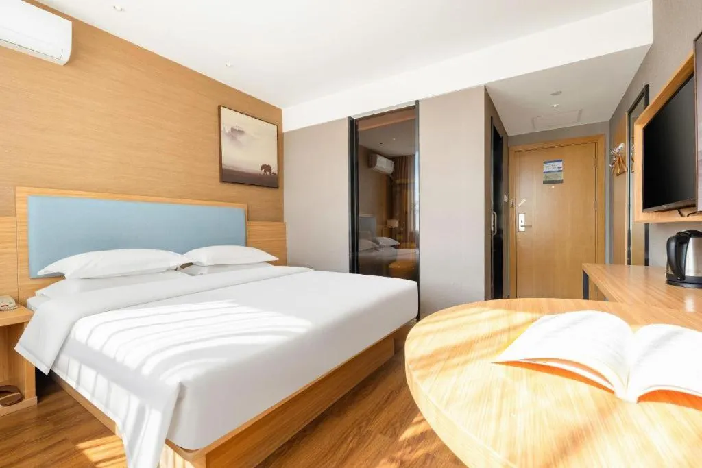 Bed in JTOUR Inn Guigang Life Port High-speed Railway Station