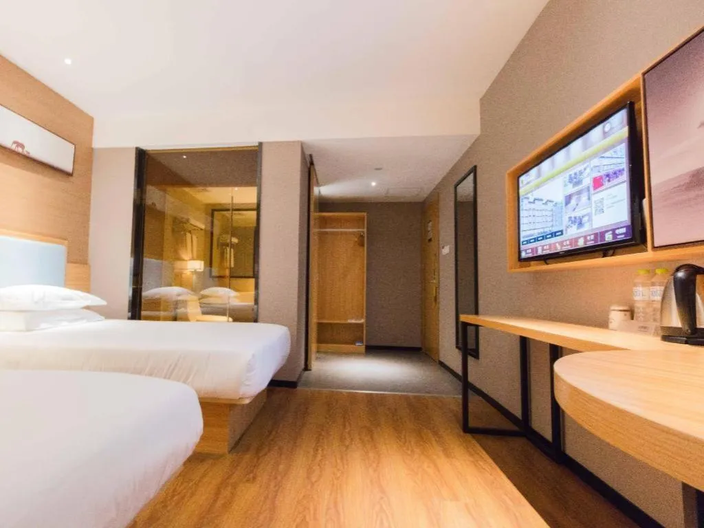 Bed in JTOUR Inn Guigang Life Port High-speed Railway Station