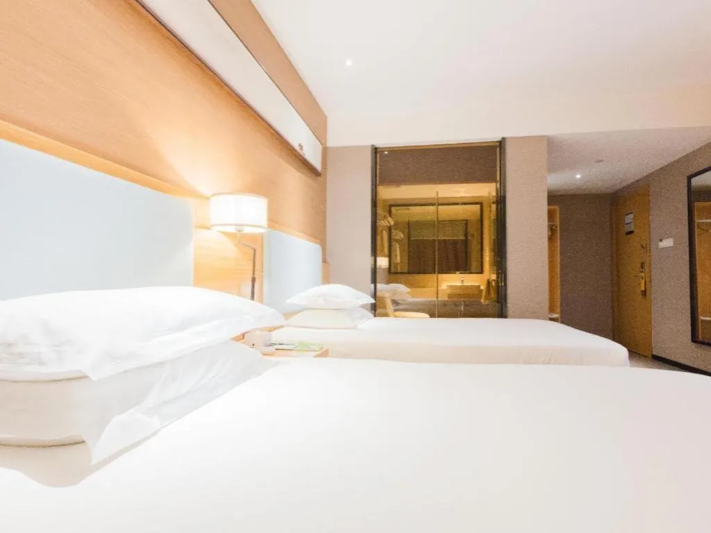 Bed in JTOUR Inn Guigang Life Port High-speed Railway Station