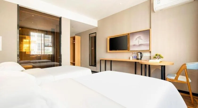 Bed in JTOUR Inn Guigang Life Port High-speed Railway Station