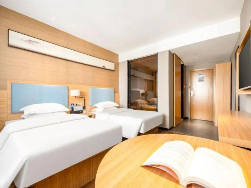 Bed in JTOUR Inn Guigang Life Port High-speed Railway Station