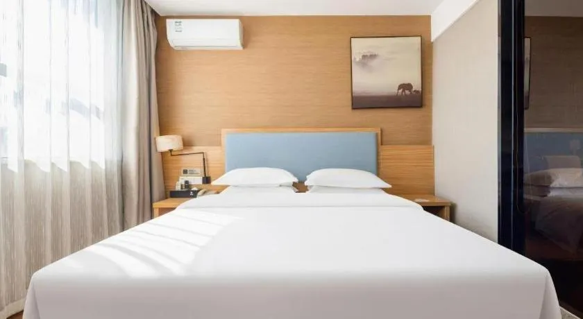 Bed in JTOUR Inn Guigang Life Port High-speed Railway Station