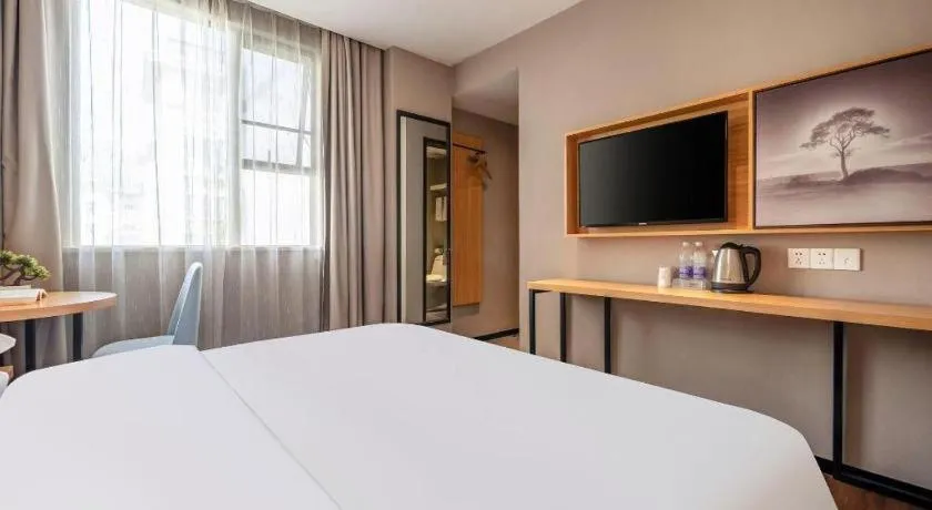 Bed in JTOUR Inn Guigang Life Port High-speed Railway Station