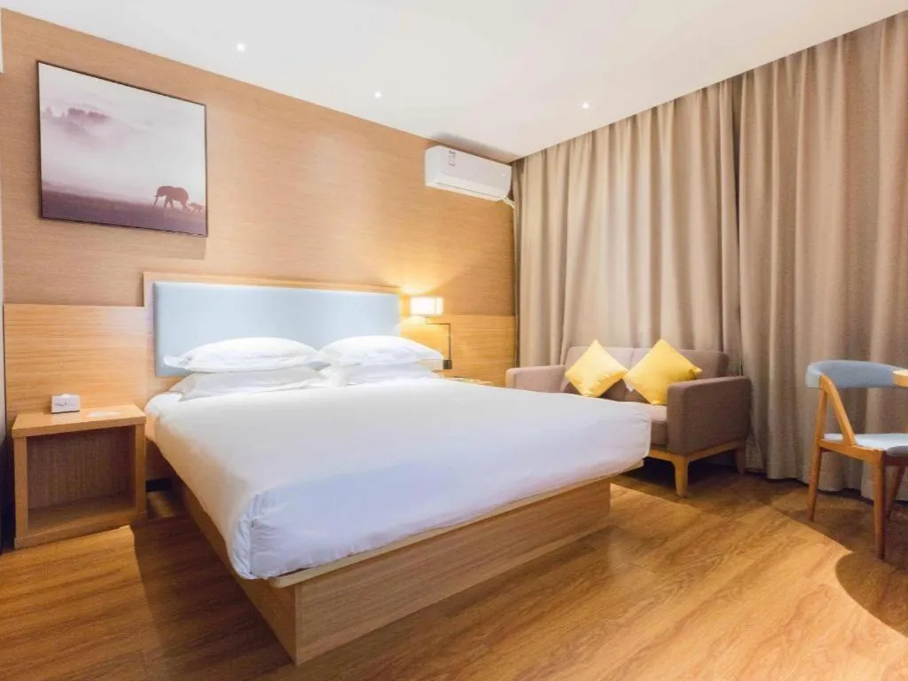 Bed in JTOUR Inn Guigang Life Port High-speed Railway Station