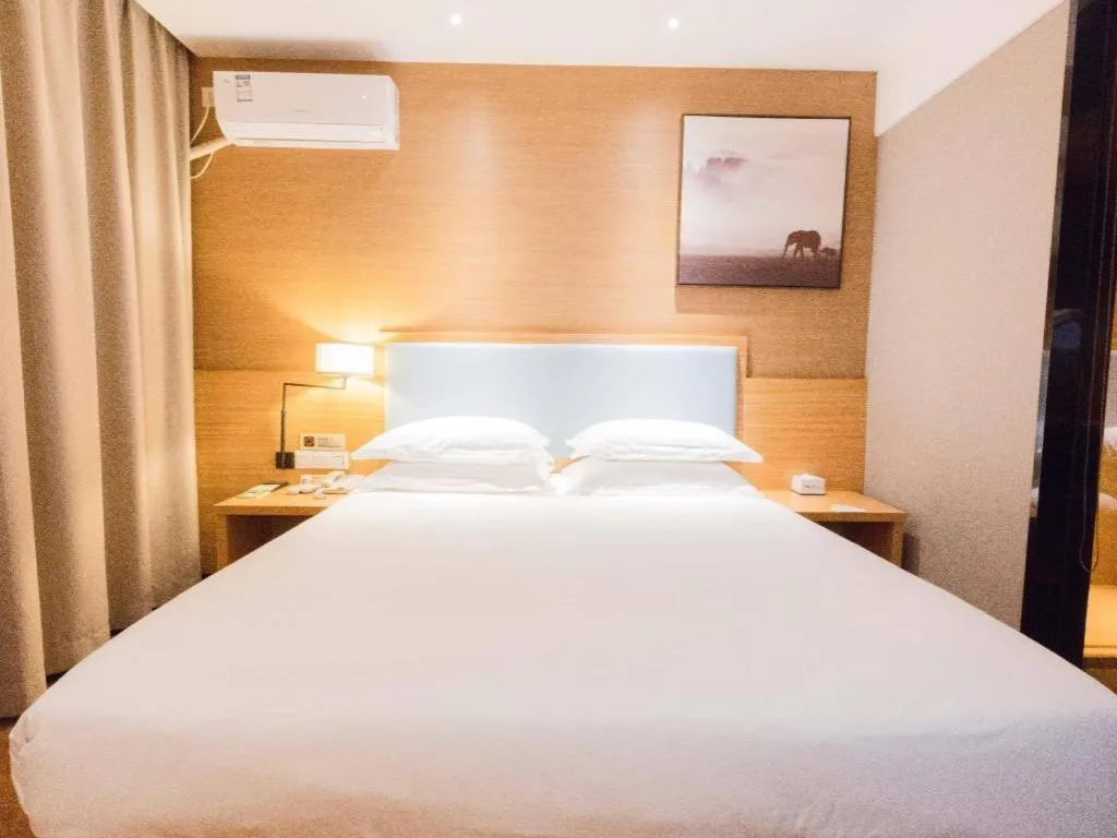 Bed in JTOUR Inn Guigang Life Port High-speed Railway Station