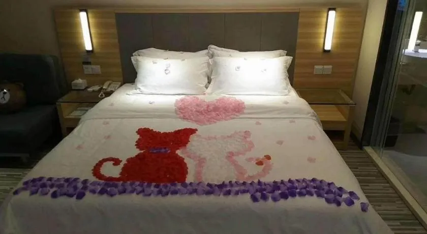 Bed in JTOUR Inn Guigang Life Port High-speed Railway Station