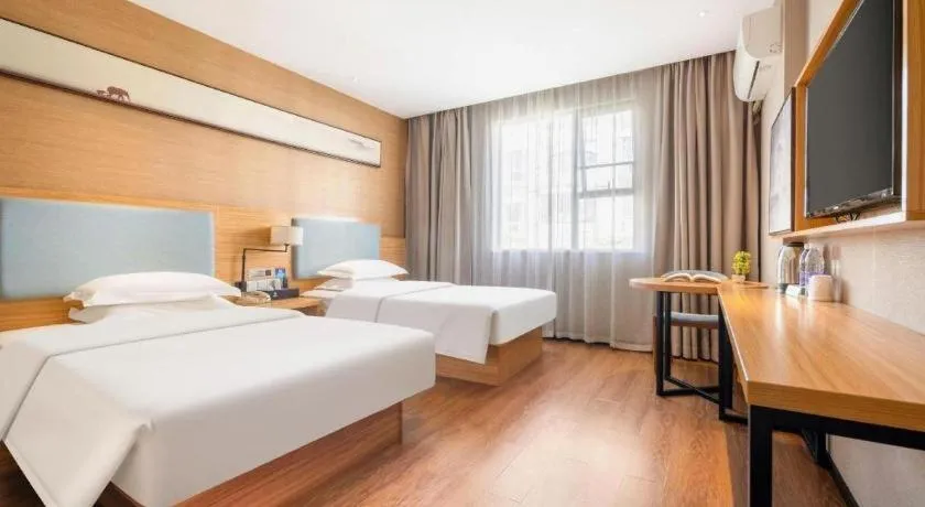 Bed in JTOUR Inn Guigang Life Port High-speed Railway Station