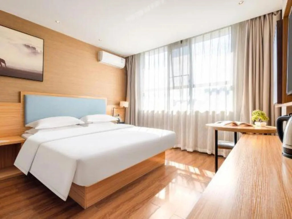 Bed in JTOUR Inn Guigang Life Port High-speed Railway Station