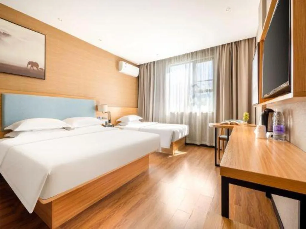 Bed in JTOUR Inn Guigang Life Port High-speed Railway Station